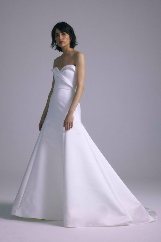 Damian, $5,400, dress from Collection Bridal by Amsale, Fabric: italian-double-face-duchess-satin