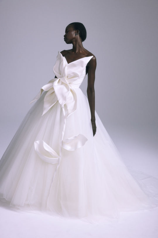 Orchid, $12,000, dress from Collection Bridal by Amsale, Fabric: taffeta