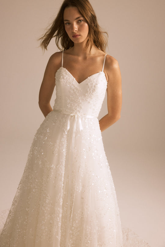 Astrid, $4,400, dress from Collection Bridal by Nouvelle Amsale