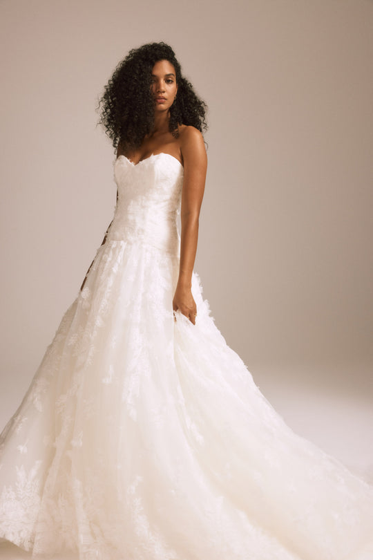 Marigold, $4,995, dress from Collection Bridal by Nouvelle Amsale