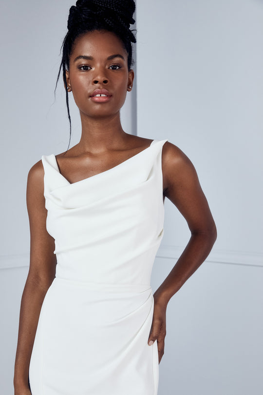 Amala, $3,995, dress from Collection Bridal by Amsale, Fabric: crepe