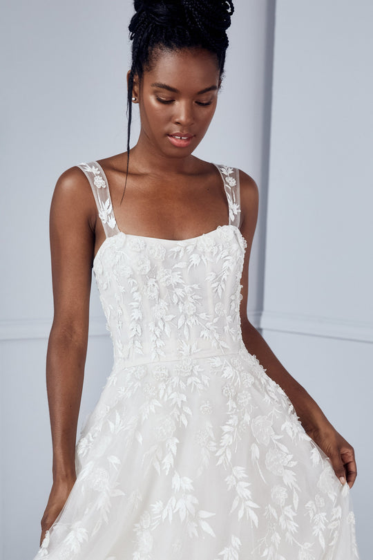 Yumi, $7,250, dress from Collection Bridal by Amsale, Fabric: tulle