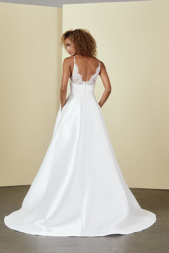 Smith, $2,395, dress from Collection Bridal by Nouvelle Amsale, Fabric: mikado
