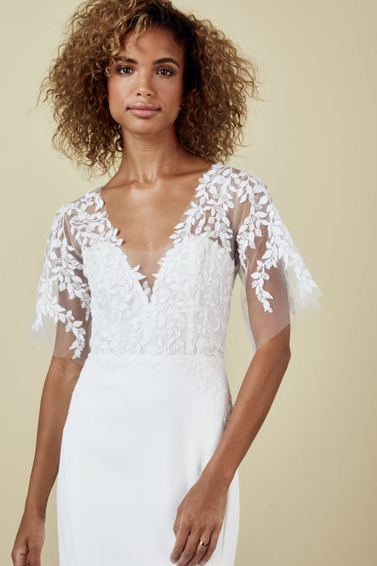 Paloma, $2,595, dress from Collection Bridal by Nouvelle Amsale, Fabric: crepe