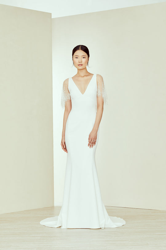 Jay, $4,395, dress from Collection Bridal by Amsale, Fabric: crepe
