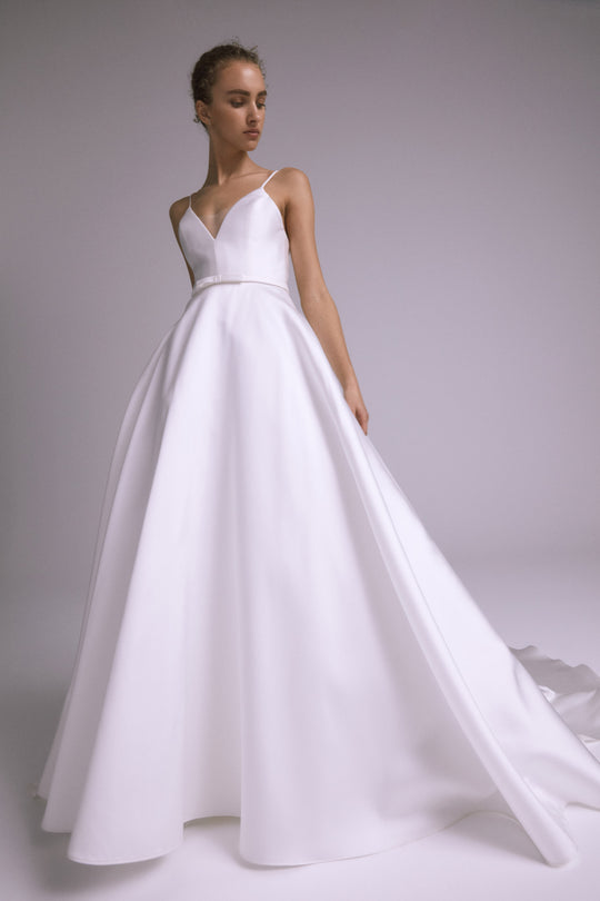 Baker, $5,500, dress from Collection Bridal by Amsale, Fabric: silk-magnolia