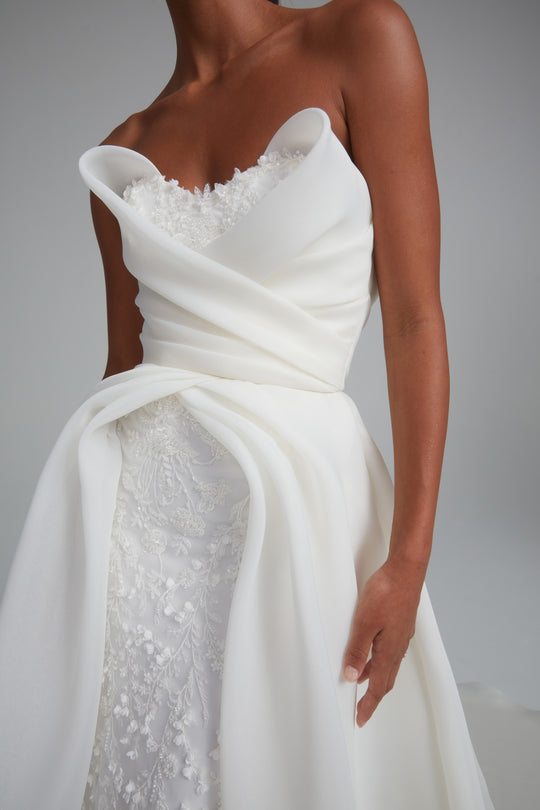 Beverley, $8,295, dress from Collection Bridal by Amsale, Fabric: gazar