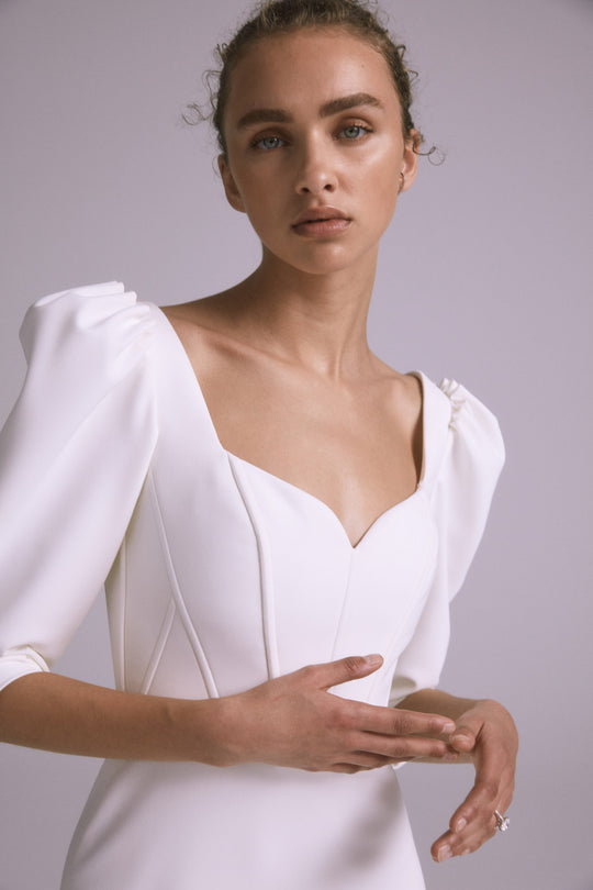 Emiko, $4,295, dress from Collection Bridal by Amsale, Fabric: stretch-fluid-crepe