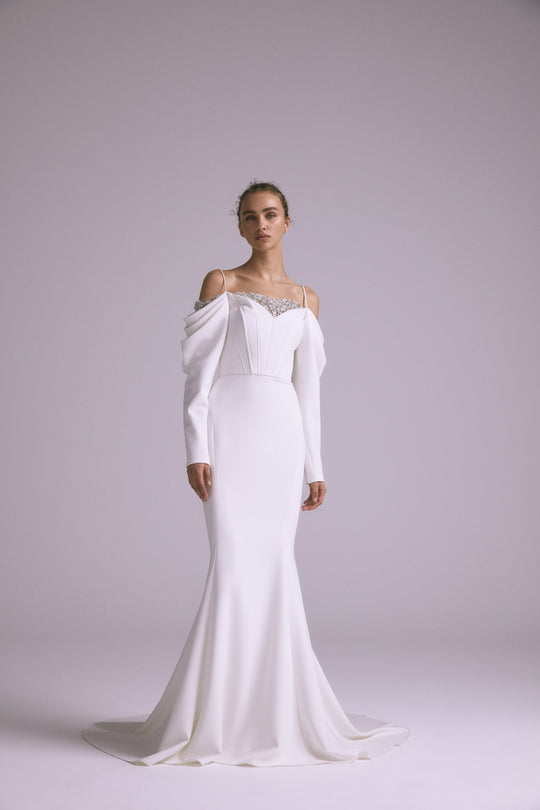 Frida, $5,495, dress from Collection Bridal by Amsale, Fabric: stretch-fluid-crepe