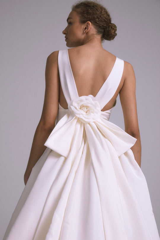 Hendrix, $6,995, dress from Collection Bridal by Amsale, Fabric: faille