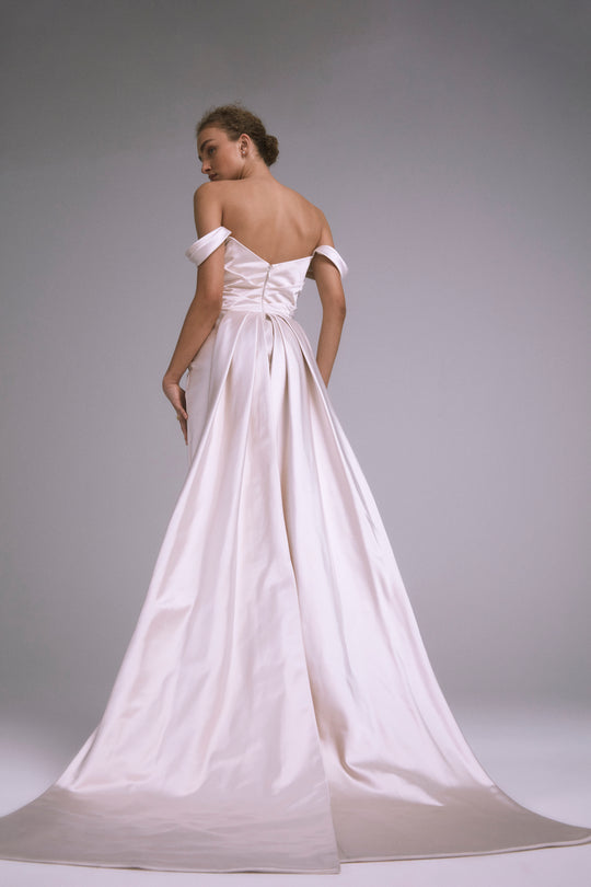 Juniper, $5,300, dress from Collection Bridal by Amsale, Fabric: faille