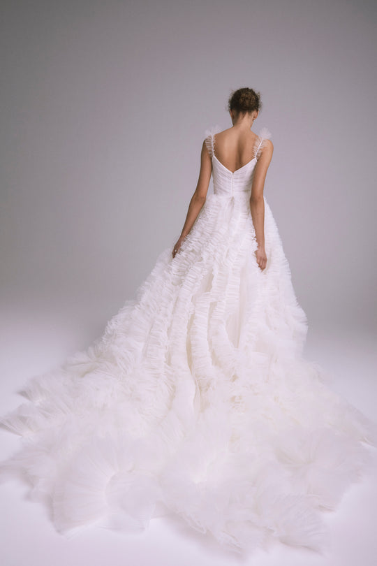 Kahlo, $9,995, dress from Collection Bridal by Amsale, Fabric: faille