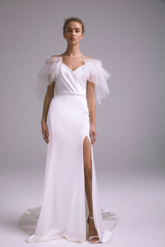 Kit, $5,595, dress from Collection Bridal by Amsale, Fabric: faille