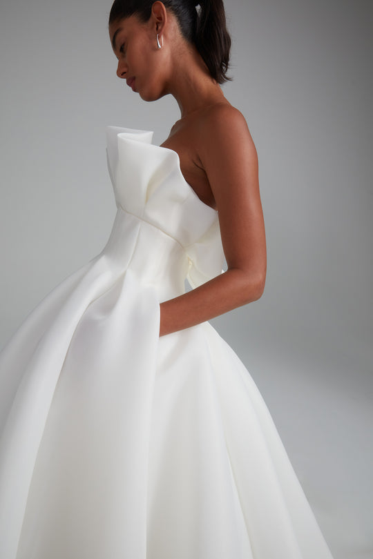 Lark, $6,995, dress from Collection Bridal by Amsale, Fabric: gazar