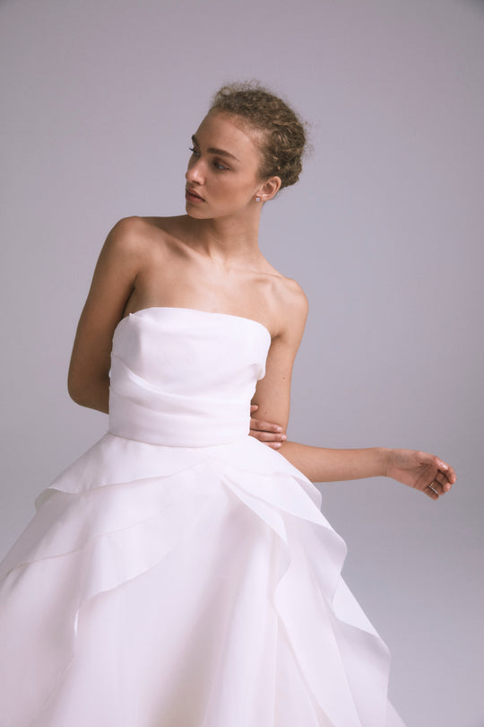 Lotus, $6,995, dress from Collection Bridal by Amsale, Fabric: faille