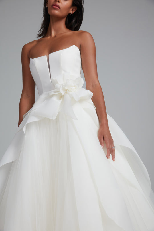Lowe, $7,400, dress from Collection Bridal by Amsale, Fabric: gazar-and-tulle