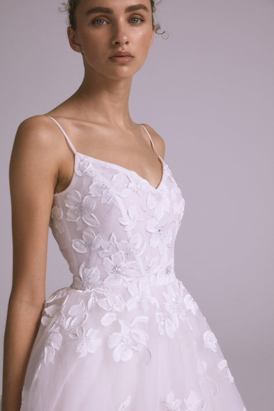 Luca, $12,000, dress from Collection Bridal by Amsale, Fabric: tulle