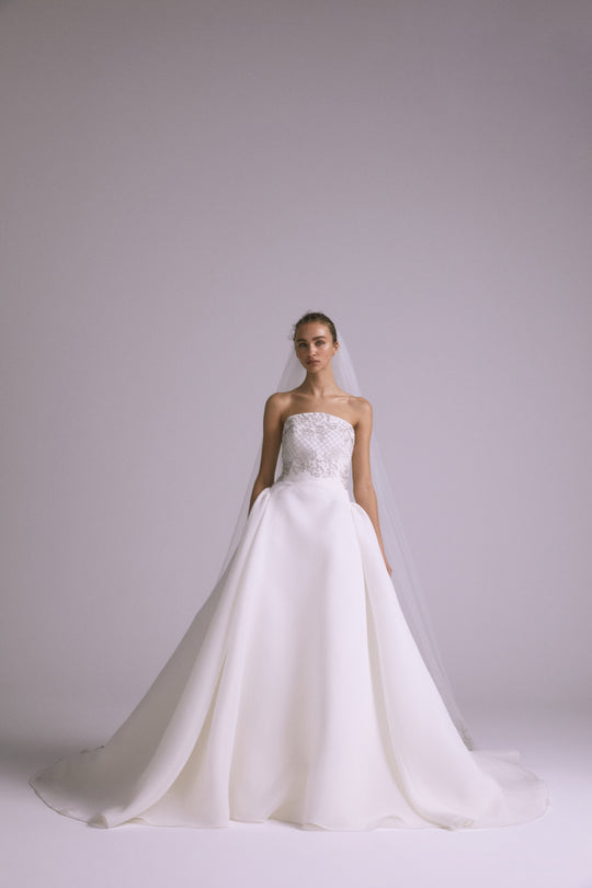 Noor, $7,250, dress from Collection Bridal by Amsale, Fabric: gazar