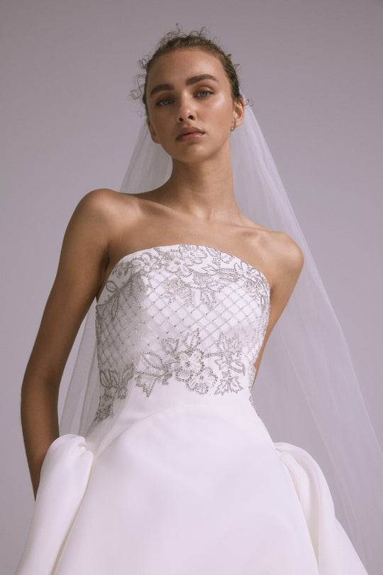 Noor, $7,250, dress from Collection Bridal by Amsale, Fabric: gazar