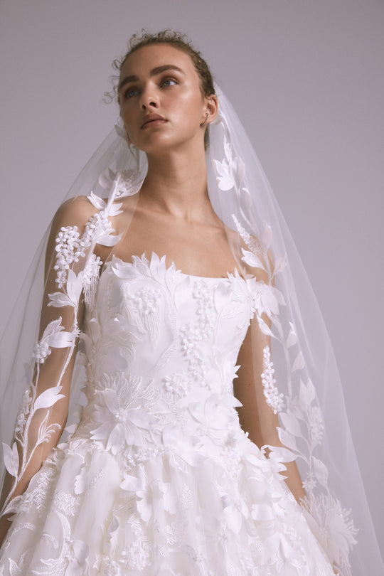 Olena, $7,495, dress from Collection Bridal by Amsale, Fabric: gazar