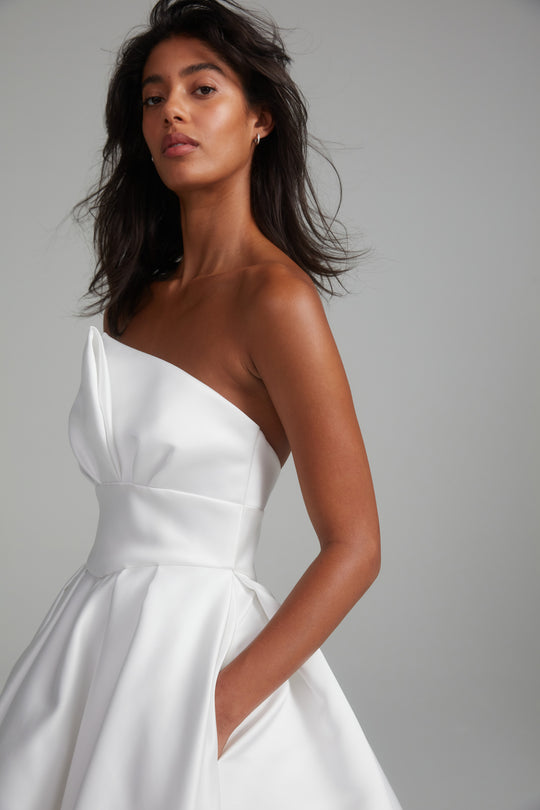 Rhodes, $6,295, dress from Collection Bridal by Amsale, Fabric: duchess-satin
