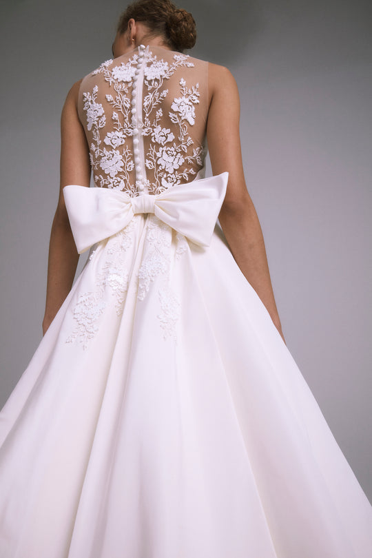 Sable, $7,495, dress from Collection Bridal by Amsale, Fabric: faille