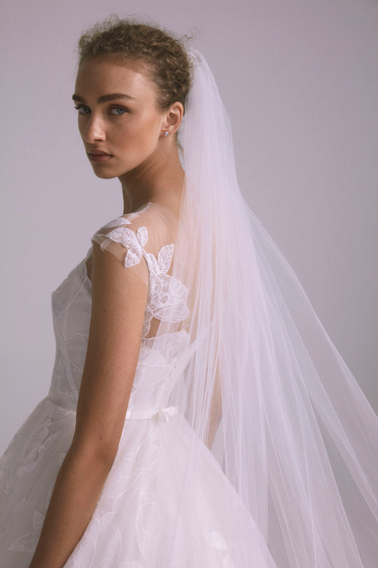 Stratton, $5,500, dress from Collection Bridal by Amsale, Fabric: faille