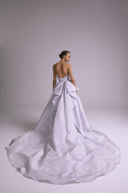 Tatum, $9,595, dress from Collection Bridal by Amsale, Fabric: taffeta