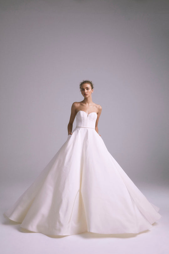 Teddy, $5,500, dress from Collection Bridal by Amsale, Fabric: faille