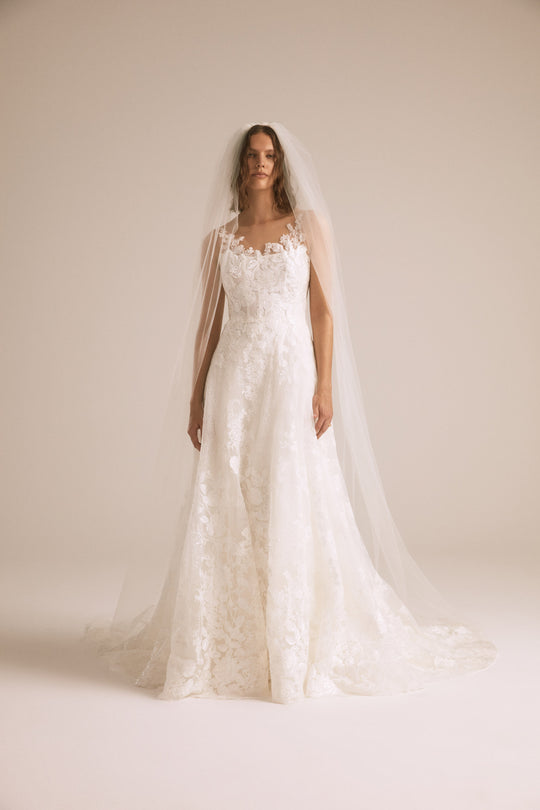 Anisa, $4,250, dress from Collection Bridal by Nouvelle Amsale, Fabric: floral