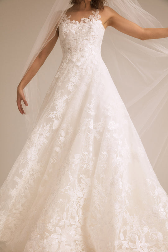 Anisa, $4,250, dress from Collection Bridal by Nouvelle Amsale, Fabric: floral