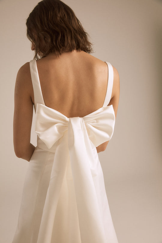 Coda, $2,595, dress from Collection Bridal by Nouvelle Amsale, Fabric: duchess-satin