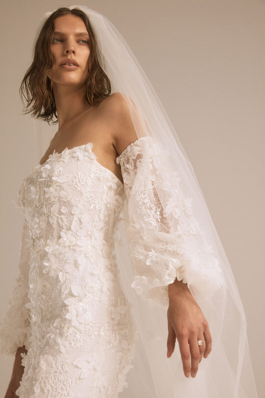 Grace, $3,995, dress from Collection Bridal by Nouvelle Amsale, Fabric: floral