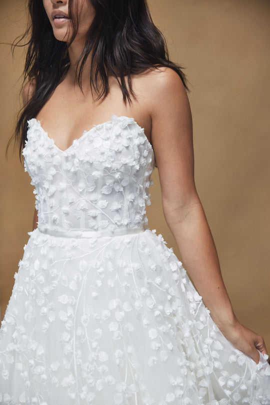 Maddie, $4,995, dress from Collection Bridal by Nouvelle Amsale