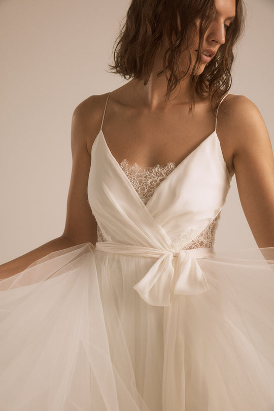 Penny, $2,995, dress from Collection Bridal by Nouvelle Amsale, Fabric: silk-chiffon