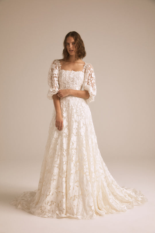 Sedona, $4,250, dress from Collection Bridal by Nouvelle Amsale, Fabric: floral