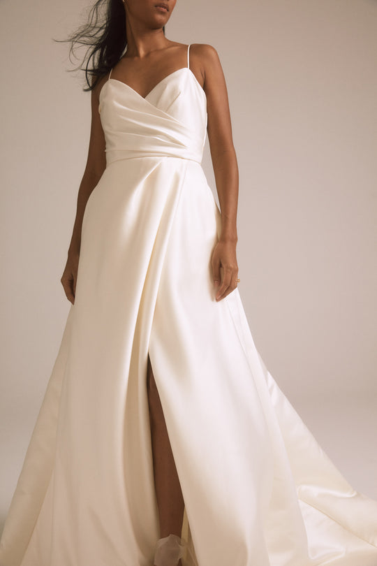 Shay, $2,795, dress from Collection Bridal by Nouvelle Amsale, Fabric: duchess-satin
