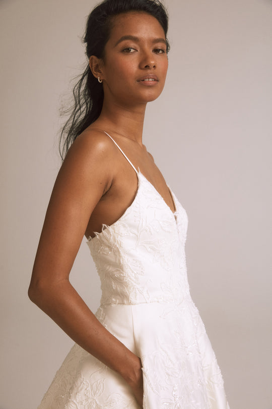 Valencia, $3,995, dress from Collection Bridal by Nouvelle Amsale, Fabric: duchess-satin