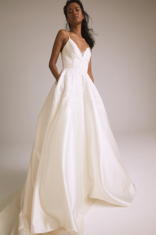 Valencia, $3,995, dress from Collection Bridal by Nouvelle Amsale, Fabric: duchess-satin