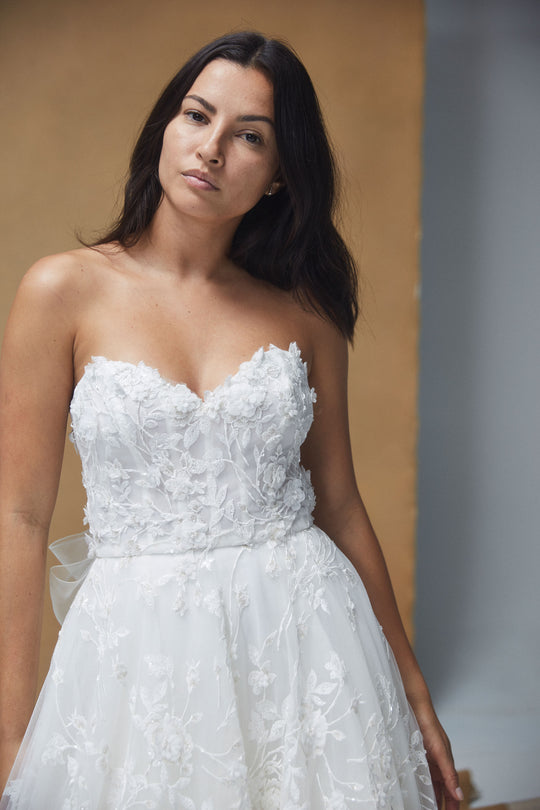 Violet, $4,500, dress from Collection Bridal by Nouvelle Amsale