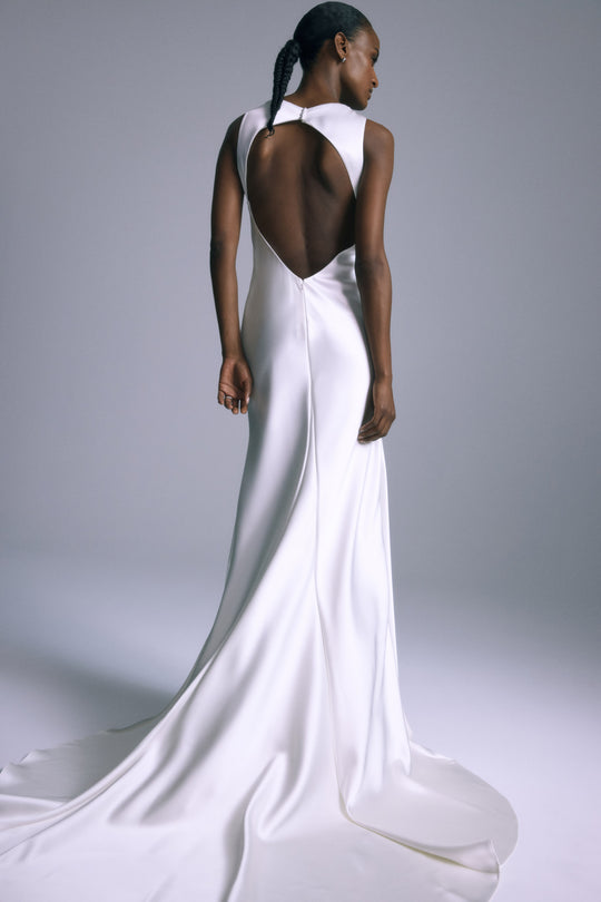 Iman, $5,400, dress from Collection Amsale, Fabric: liquid-satin