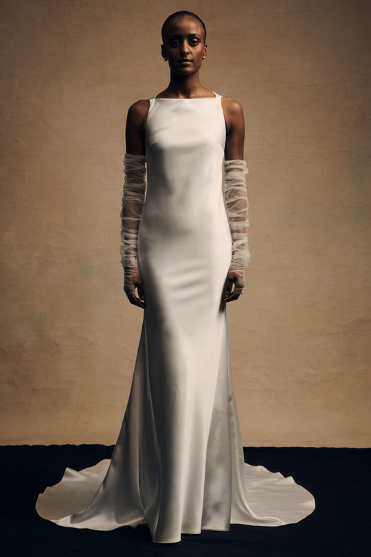 Iman, $5,400, dress from Collection Bridal by Amsale, Fabric: liquid-satin