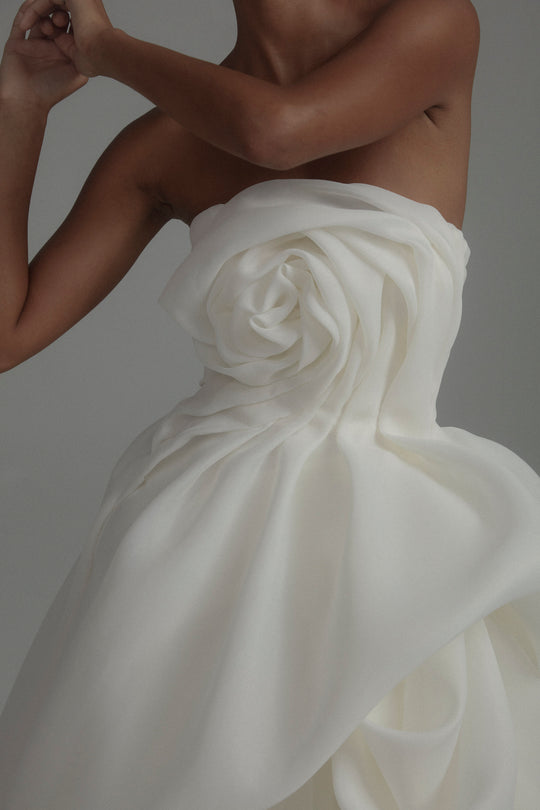 Rosemary, $12,000, dress from Collection Bridal by Amsale, Fabric: gazar