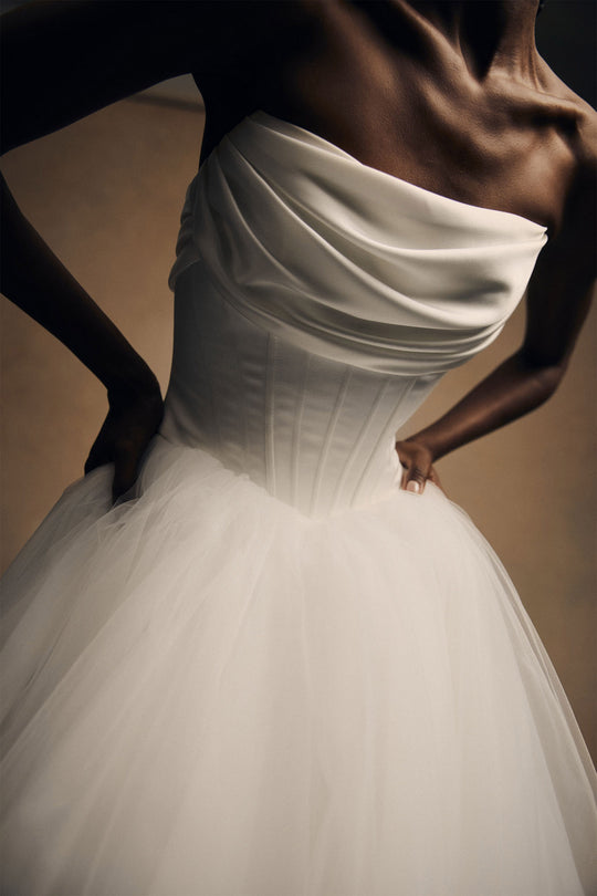 Onyx, $7,400, dress from Collection Bridal by Amsale, Fabric: satin-back-crepe