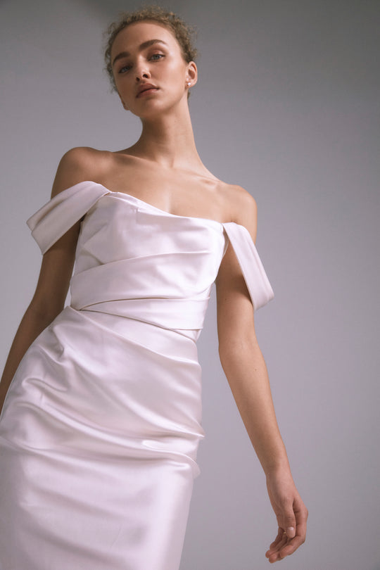 Juniper, $5,300, dress from Collection Bridal by Amsale, Fabric: faille