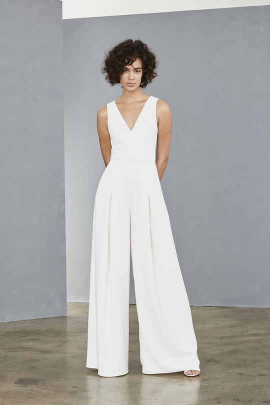 Sheer back Jumpsuit, $200, dress from Collection Little White Dress by Amsale